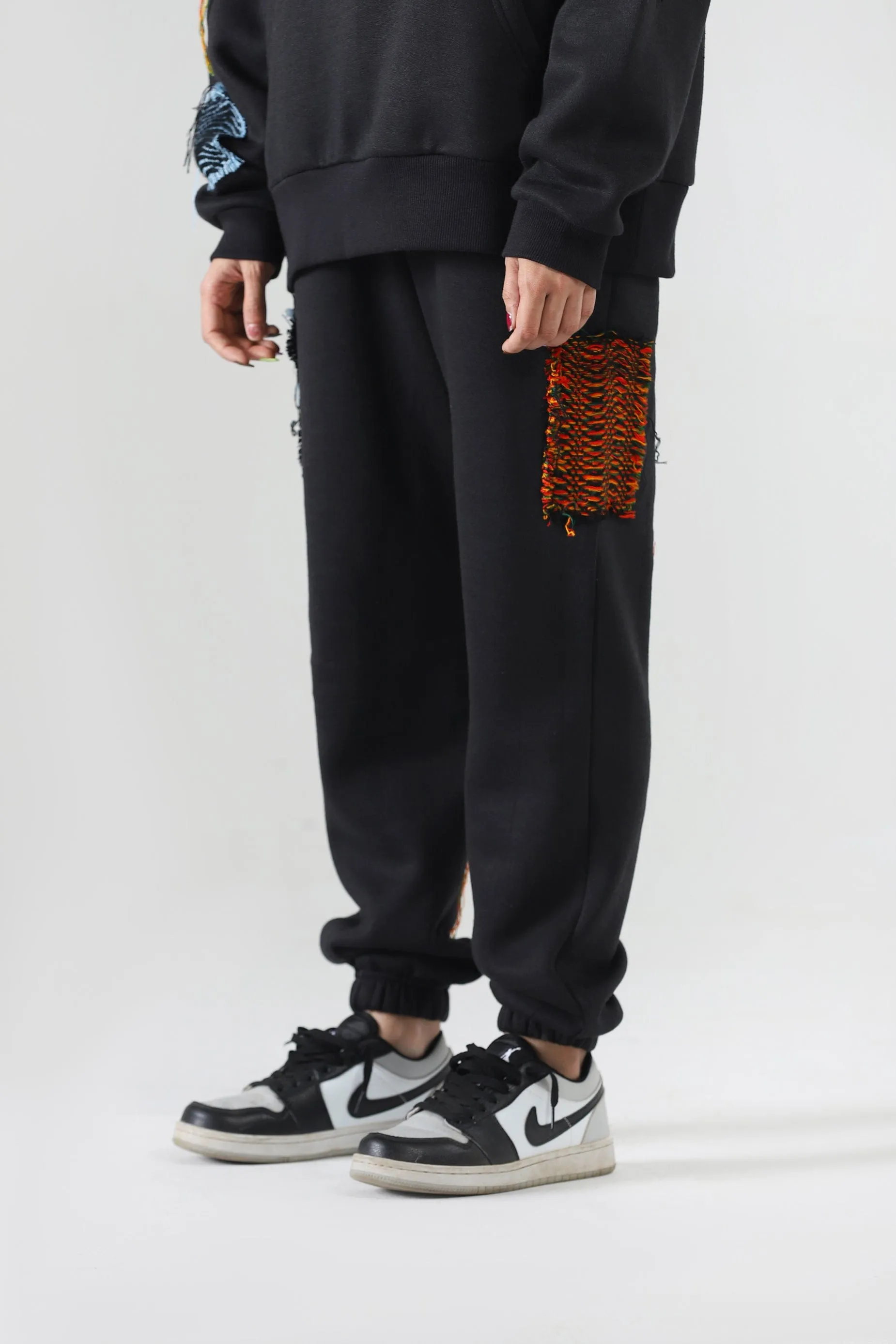 HANDWOVEN PATCH SWEATPANTS