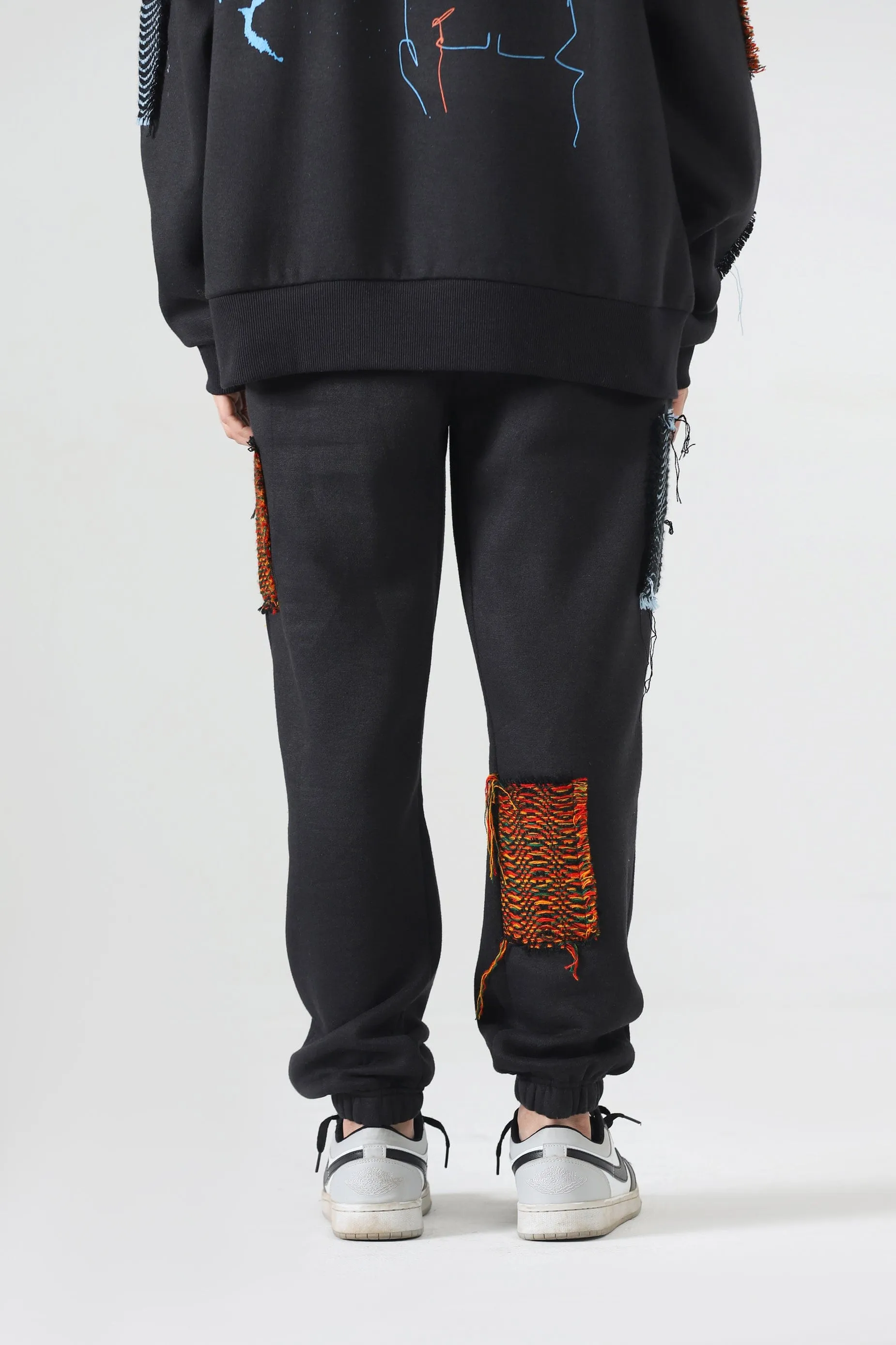 HANDWOVEN PATCH SWEATPANTS