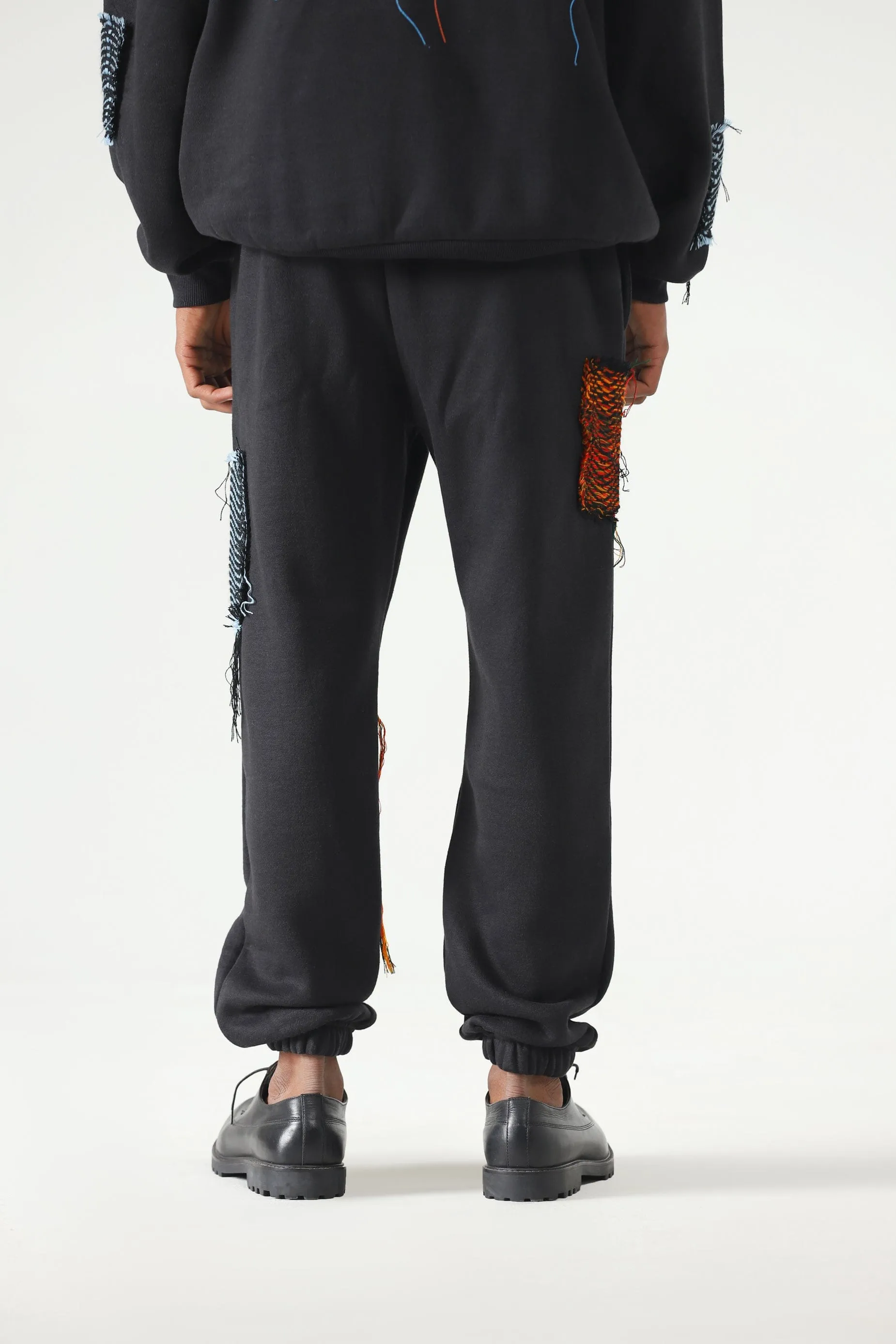 HANDWOVEN PATCH SWEATPANTS